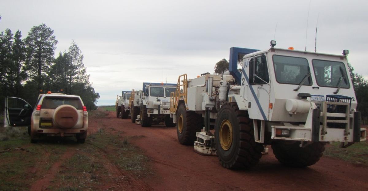 Vibroseis trucks on road